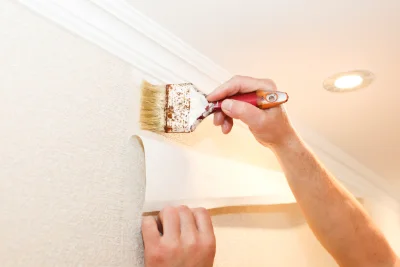Pose de papier peint à Porte des Pierres Dorées — revêtements muraux et toiles de verre